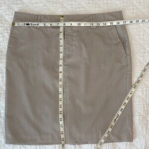 Classic Tan pinstriped skirt by apostrophe